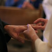 Exchanging Rings At Vow Renewal Ceremony