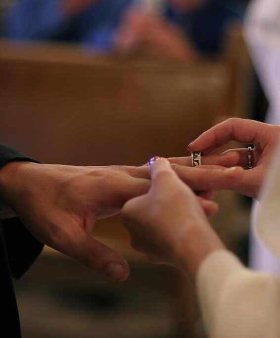 Exchanging Rings At Vow Renewal Ceremony