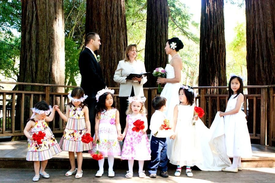 Children in front of couple ready to marry