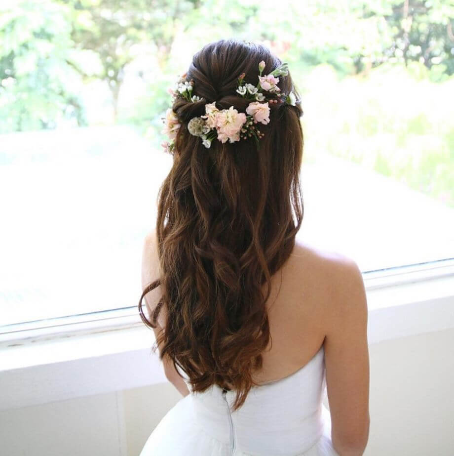 soft waves and flowers wedding hairstyle