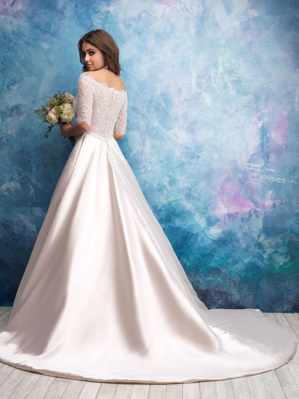 Allure Bridals 9553 gown with three-quarter sleeves and chapel length train