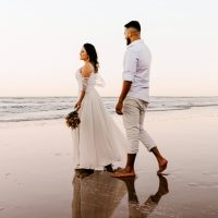 12 Effortless Swoon Worthy Beach Wedding Dresses