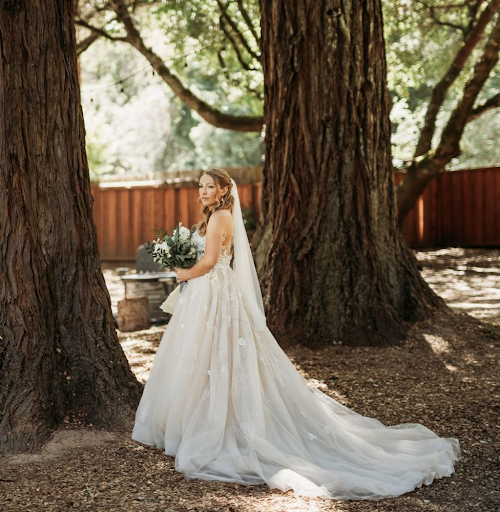Bride posing in the forest