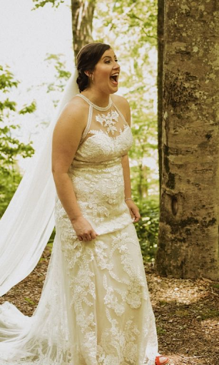 Lovely bride having a laugh on her wedding day