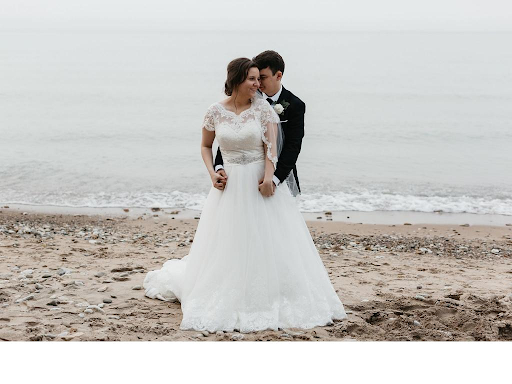 bride and groom on beach