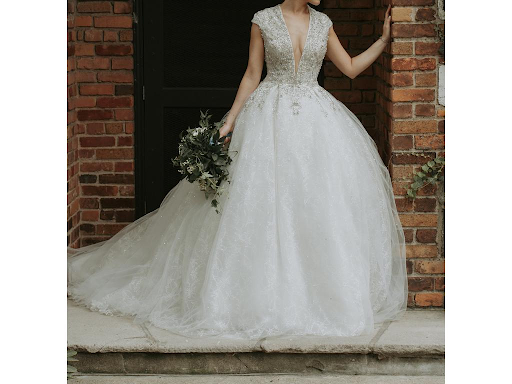 Gorgeous lacey ball gown wedding dress