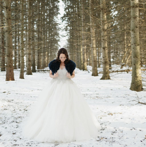 Winter bride in ball gown with natural waistline