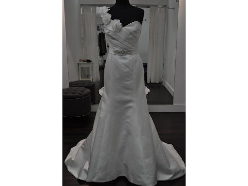Simple one should strap dress displayed on a mannequin