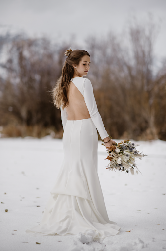 Gorgeous wedding gown with an open back