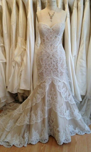 Stunning lace gown with basque waistline
