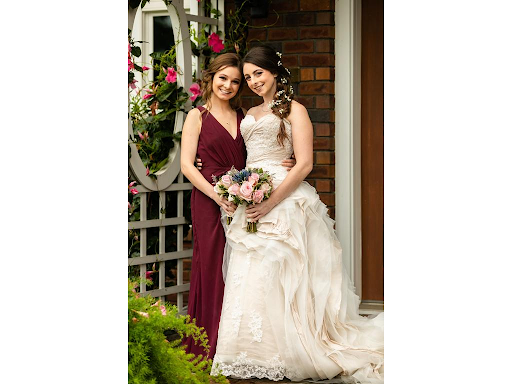 Bride and sister in beautiful dresses