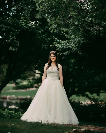 Beautiful bride backdropped by forest