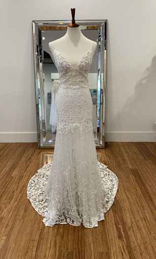 Lace gown displayed on a mannequin