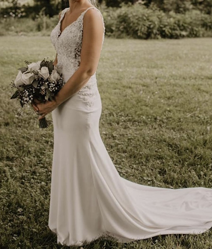 gorgeous princess wedding dress in field