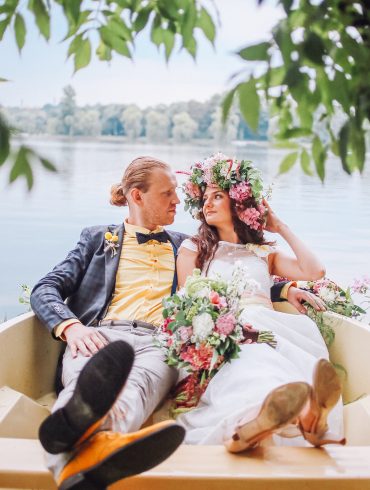 Bride and groom in a rowboat