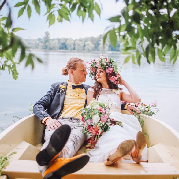 Bride and groom in a rowboat
