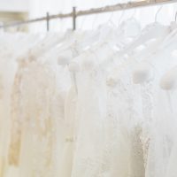 Variety of wedding dresses on a rack
