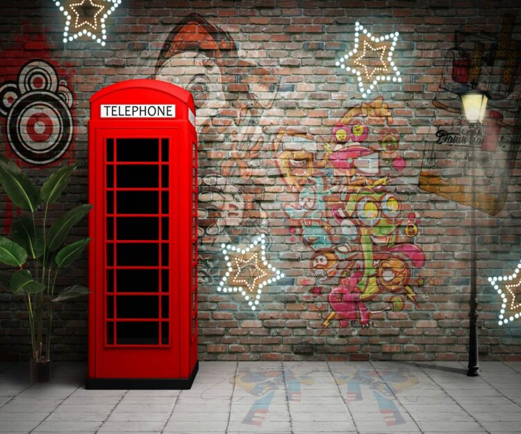 Phone booth and graffiti wall backdrop