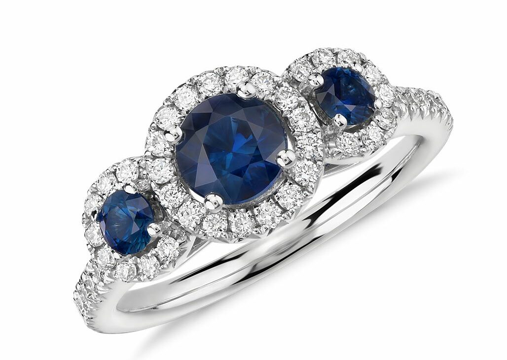 Isola sapphire and diamond halo 3-stone ring