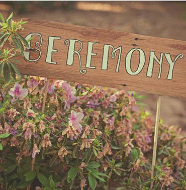 wooden ceremony signs