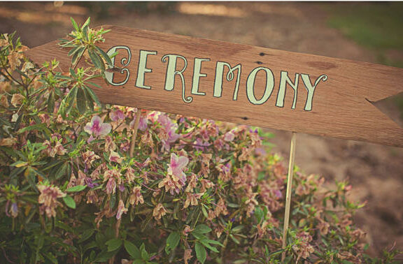 wooden ceremony signs