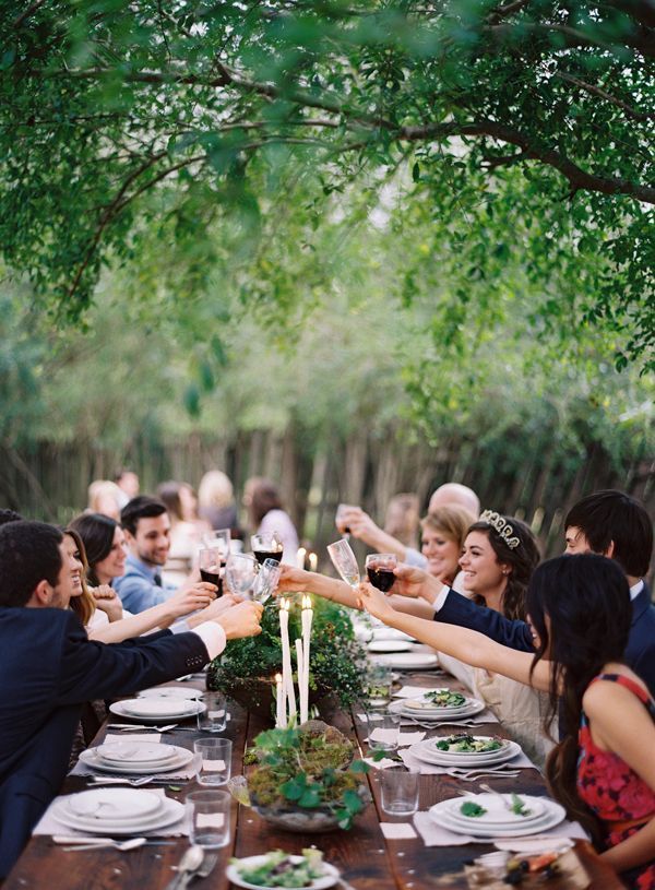 cheers-toast-wedding-reception-wine-under-trees-backyard-outdoor-dinner-friends-alfresco