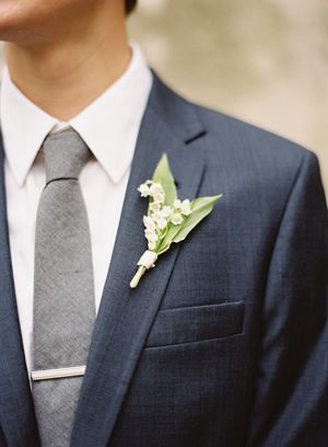 groom-navy-j-crew-suit-gray-tie-bar-clip-lily-of-the-valley-bout
