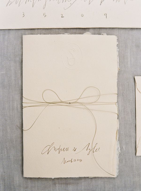handmade-paper-deckled-edge-rough-ivory-pencil-hand-lettering-wedding-invitation-bow-twine