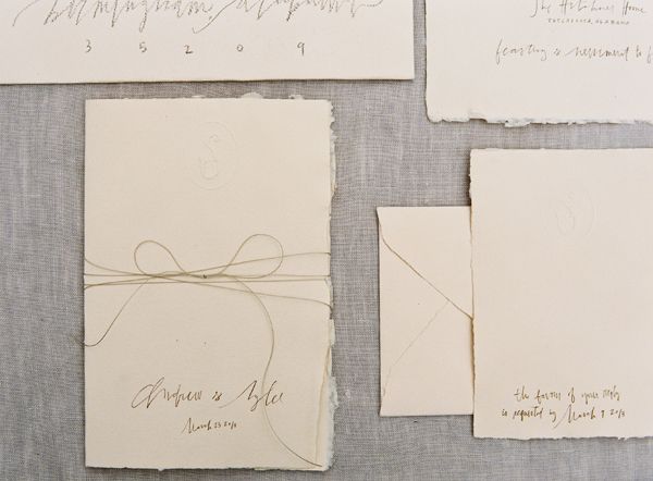 meagan-tidwell-callicraphy-ivory-handmade-paper-invitation-suite-bow-twine-blind-embossed