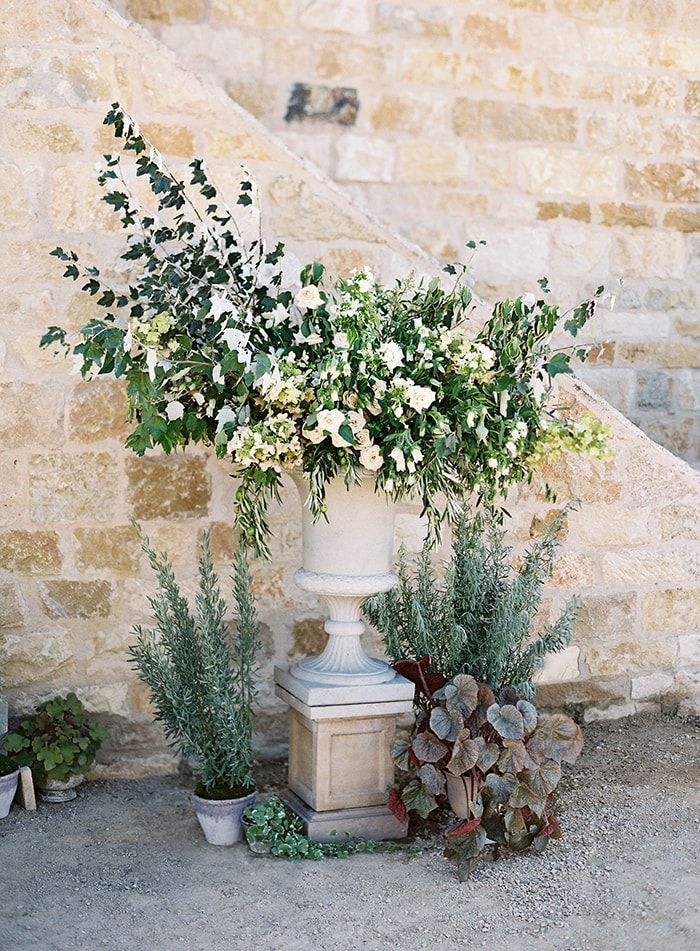 28-green-floral-arrangement-stone-urn