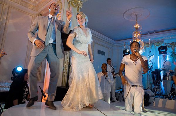 Bride And Groom Dance On Stage