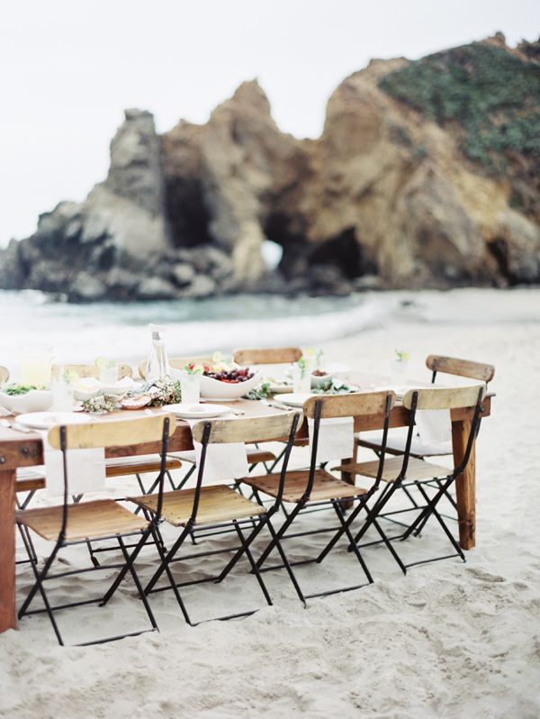 pfeiffer-beach-wedding-reception-lunch-long-wooden-table-chairs