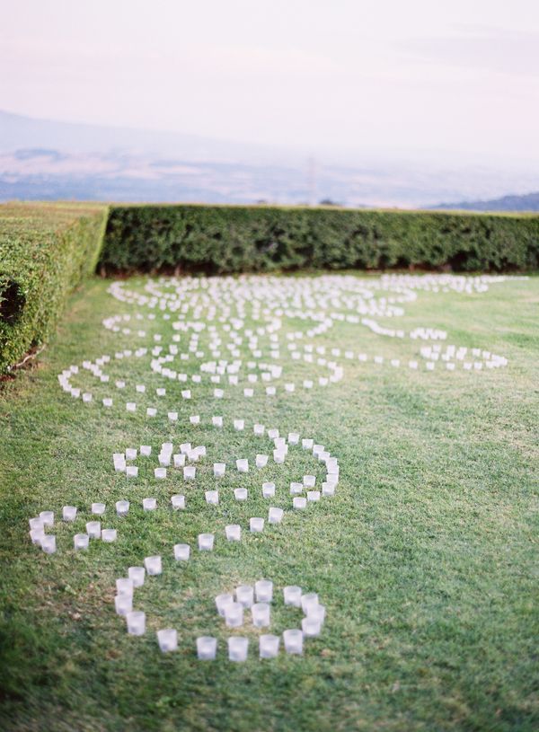 Swirling Votives On The Lawn Ceremony Decor