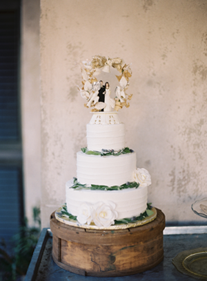 vintage-white-buttercream-wedding-cake-with-vintage-caketopper